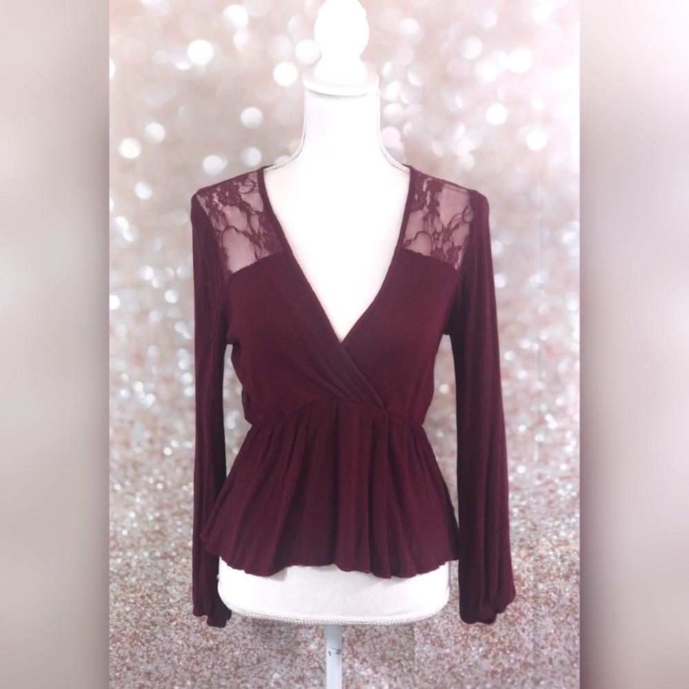 Sheer lace peplum top